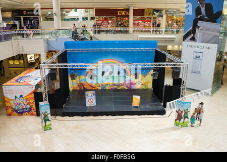 Performance stage in the centre of the Intu MetroCentre, Gateshead.  Known on road signs as the Metro Centre. Stock Photo