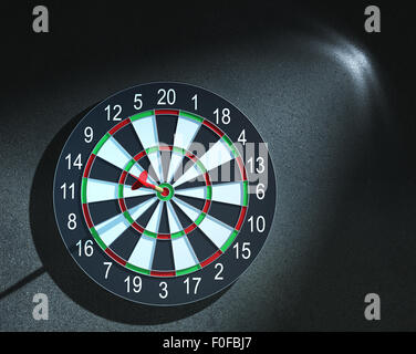 Darts arrow in bull's-eye Stock Photo