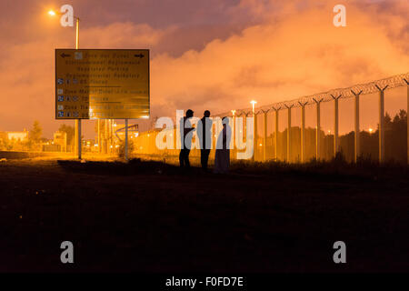 Thousands of migrants endure misery of 'jungle' makeshift camps near Calais. Stock Photo