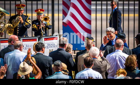 (150814) -- HAVANA, Aug. 14, 2015 (Xinhua) -- U.S. Secretary of State John Kerry (R, back) gestures during the flag raising ceremony at the U.S. Embassy in Havana, Cuba, on Aug. 14, 2015. Kerry chaired here on Friday the formal ceremony of raising the American flag in the recently reopened U.S. embassy in Cuba, after 54 years of animosity between the two neighbors.  (Xinhua/Liu Bin) Stock Photo
