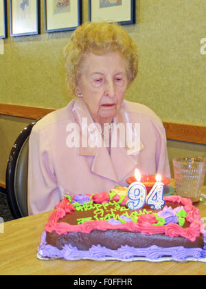 Elderly lady celebrating birthday Stock Photo