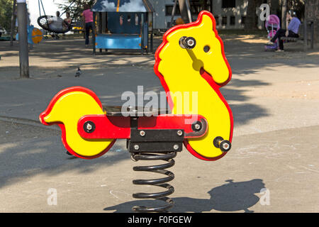 Rocking horse in the park. Stock Photo