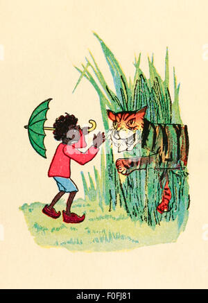Little Black Sambo meets the Tiger who wants to eat him! Image from 'The Story of Little Black Sambo' by Helen Bannerman. See description for more information. Stock Photo