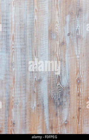 Aged wooden background of weathered distressed rustic wood boards with faded light blue paint showing brown woodgrain texture Stock Photo