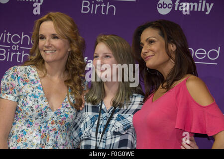 Anaheim, California, USA. 14th Aug, 2015. Fan Rebecca Sarles takes a photo with actors Lea Thompson and Constance Marie (Switched at Birth) at the Disney D23 Expo in Anaheim, CA Credit:  Kayte Deioma/Alamy Live News Stock Photo