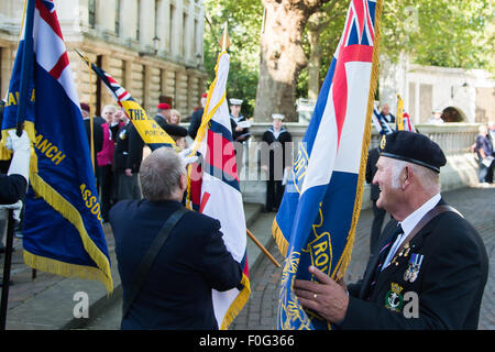 Portsmouth, UK. 15th Aug, 2015. Standard bearers gather their flags in advance of the VJ Day 70th anniversary memorial at the Cenotaph in Portsmouth. Credit:  MeonStock/Alamy Live News Stock Photo