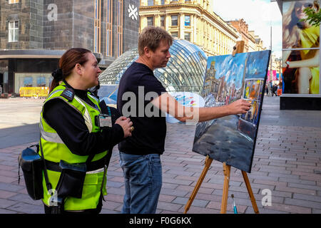 Glasgow, Scotland, UK. 15th Aug, 2015. Almost 150 artists came to Glasgow to take part in the 'Rapid Painter' art competition with the aim being to make a painting capturing the spirit of Glasgow city, completed in 1 day. The artists attracted a lot of curiosity and interest from tourists and locals, when they set up in various locations about the city. All the completed works will go on exhibition on Sunday 16 August at the Royal Concert Hall, Sauchiehall Street, Glasgow when many of the paintings will be for sale. Credit:  Findlay/Alamy Live News