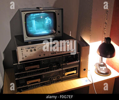 Cold War East German Stasi monitoring display in Berlin, showing a CRT screen, cassette  tape recorders and MFS state surveillance technology. Stock Photo