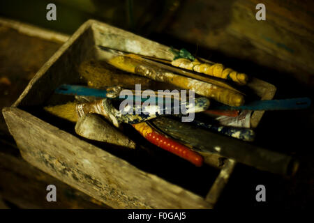 painters tools, brushes in a idol making studio Stock Photo
