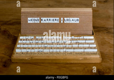 a letterbox with the german text: "Meine Karriere=Urlaub" (my career = vacation) Stock Photo