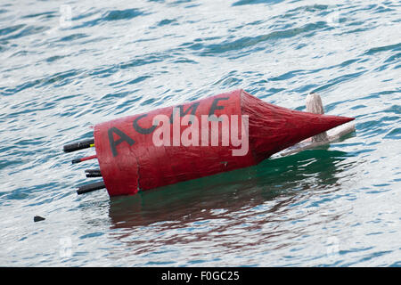 Worthing, UK. 15th Aug, 2015. The remnants of a craft float in the water. The Worthing International Birdman Festival 2015 Credit:  Stephen Bartholomew/Alamy Live News Stock Photo