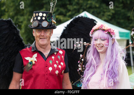 Steampunk character with fairy at the New Forest Fairy Festival, Burley, Hampshire, UK in August  Credit:  Carolyn Jenkins/Alamy Live News Stock Photo