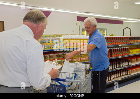 Salt Lake City, Utah - A man selects free grocery items at the Bishop's Storehouse at the Mormon Church's Welfare Square complex Stock Photo