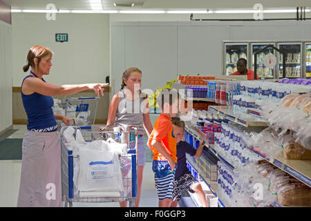 Salt Lake City, Utah - The Relief Society president of a Mormon ward (congregation) picks up groceries for a needy member. Stock Photo