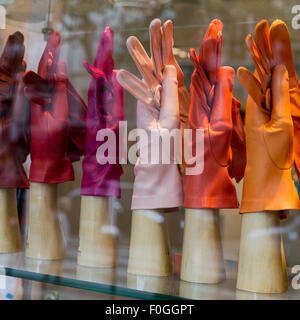 Womens leather gloves on display in a shop window in Paris France Stock Photo