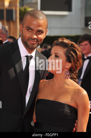 LOS ANGELES, CA - AUGUST 29, 2010: Eva Longoria Parker & husband Tony Parker at the 2010 Primetime Emmy Awards at the Nokia Theatre L.A. Live in downtown Los Angeles. Stock Photo