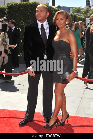 LOS ANGELES, CA - AUGUST 21, 2010: Spice Girl Melanie Brown, aka Mel B. & husband Stephen Belafonte at the 2010 Creative Arts Emmy Awards at the Nokia Theatre L.A. Live. Stock Photo