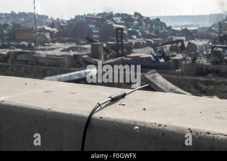 Tianjin. 16th Aug, 2015. Workers map using a drone near the explosion ...