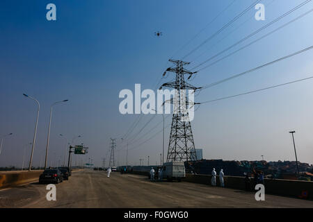 Tianjin. 16th Aug, 2015. Workers map using a drone near the explosion ...