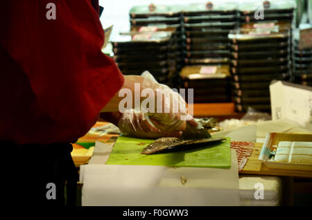 Japanese chef slicing fish for cook Japan food Stock Photo