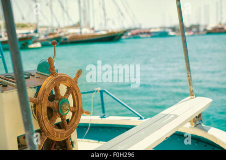 Old boat steering wheel from wood Stock Photo