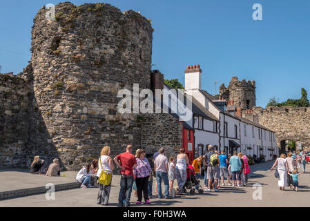 Conway quayside Conwy Gwynedd North Wales. Smallest house in Wales in red. Stock Photo