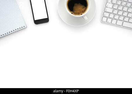 Top view with copy space, office desk table with smartphone and coffee cup Stock Photo