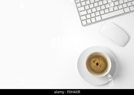 Top view with copy space, office desk table with computer and coffee cup Stock Photo