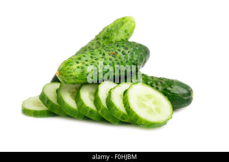 Cucumber and slices isolated over white background Stock Photo