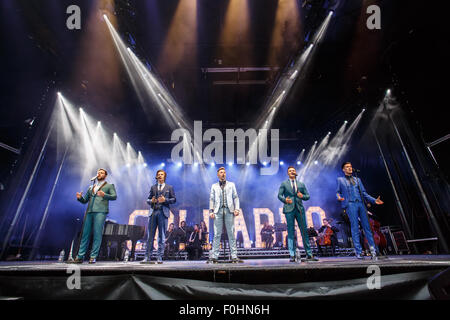 Betley, Cheshire, UK. 16th August, 2015. Collabro performs live at Betley Concerts held at Betley Court Farm, near Crewe, Cheshire. Collabro members Richard Hadfield, Thomas Redgrave, Matt Pagan, Michael Auger and Jamie Lambert entertain the crowd. Credit:  Simon Newbury/Alamy Live News Stock Photo