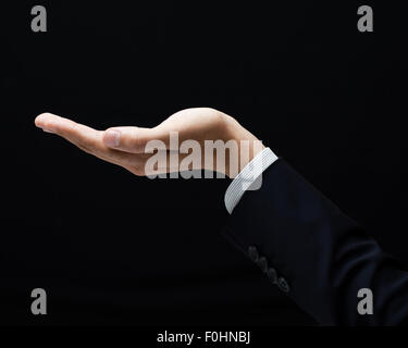 Open palm hand gesture of male Stock Photo