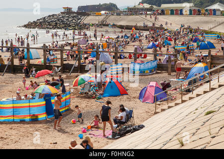 Beach holiday - crowded beach at Dawlish Warren, Devon. Stock Photo