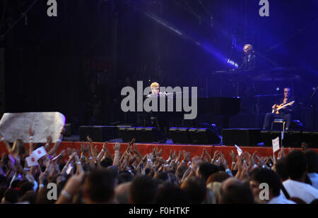 KYIV, UKRAINE - JUNE 30, 2012: Singer Sir Elton John performs onstage during charity Anti-AIDS concert at the Independence Square on June 30, 2012 in Kyiv, Ukraine Stock Photo