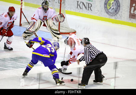 KYIV, UKRAINE - NOVEMBER 11, 2012: Referee face-off the rink during ice-hockey pre-olympic qualification game between Ukraine in Poland on November 11, 2012 in Kyiv, Ukraine Stock Photo