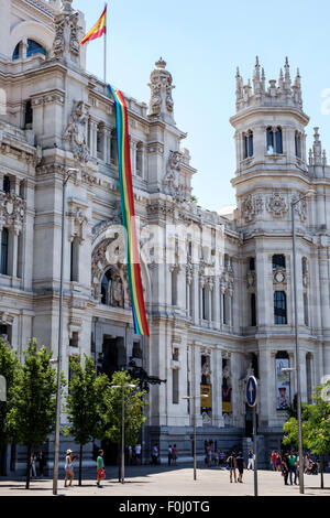Madrid Spain,Hispanic Plaza de Cibeles,Palacio de Cibeles,Palacio de Comunicaciones,exterior,outside exterior,Palace of Communications,rainbow banner, Stock Photo