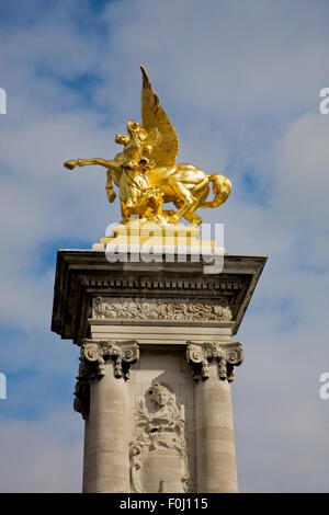 Angel statue on Pont Alexandre in Paris, France Stock Photo