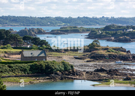 Houses and small boats on Brehat island in brittany. Cotes d'Armor during a sunny day. France Stock Photo