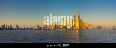 Shanghai skyline with reflection and Pudong during the sunset - april 2013 Stock Photo
