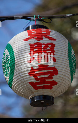 Paper lantern against a blue sky in Tokyo, Japan. Stock Photo