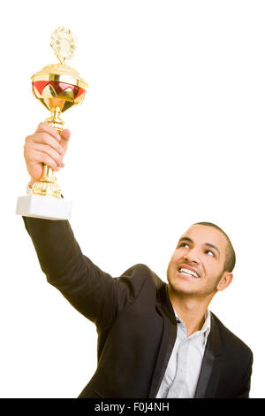 Happy business man cheering and holding a trophy Stock Photo