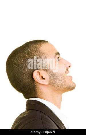 Side view of young manager looking up Stock Photo