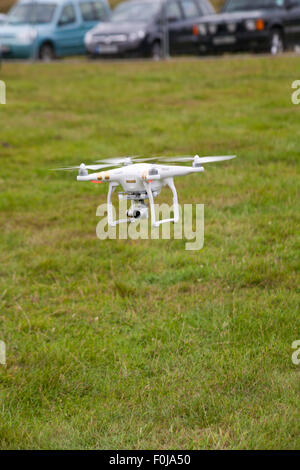 DJI Phantom drone with camera attached at the New Forest Fairy Festival, Burley, Hampshire, UK in August Stock Photo