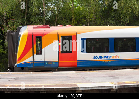 South West train stopped at Brockenhurst railway train station, New Forest, Hampshire UK in August Stock Photo