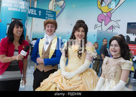 Anaheim, California, USA. 15th Aug, 2015. Allie Kawamoto interviews costumed guests Rikky Kincaid and Emily Turnbull from Melbourne, Australia  and Brianna Lake from Vancouver, BC, Canada for the D23 Expo Road Report at the Disney D23 Expo in Anaheim, CA, USA August 16, 2015. Credit:  Kayte Deioma/Alamy Live News Stock Photo