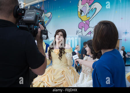Anaheim, California, USA. 15th Aug, 2015. Costumed guests Emily Turnbull from Melbourne, Australia and Brianna Lake from Vancouver, BC, Canada are interviewed for the D23 Expo Road Report at the Disney D23 Expo in Anaheim, CA, USA August 16, 2015. Credit:  Kayte Deioma/Alamy Live News Stock Photo