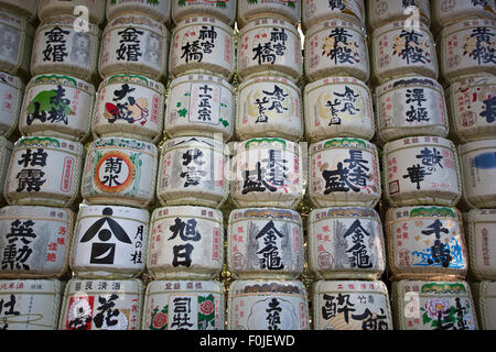Sake barrels at Meiji Jingu Shrine in Tokyo.The barrels that decorate the entrance of shrines are called Kazaridaru. Stock Photo