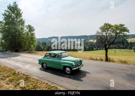 Trhova Kamenice, Czech Republic. 15th Aug, 2015. The eighth annual meeting of Skoda Spartak cars. Over thirty vintage cars arrived to Trhova Kamenice, Czech Republic, August 15, 2015. The Skoda 440 called Spartak and the similar 445 and 450 cabriolet are cars that were produced in Czechoslovakia between 1955 and 1959. © David Tanecek/CTK Photo/Alamy Live News Stock Photo