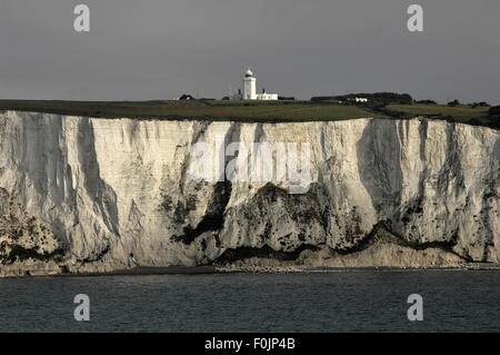 AJAXNETPHOTO. JUNE, 2015. DOVER, ENGLAND. - SOUTH FORELAND LIGHTHOUSE SITS ABOVE A SECTION OF THE CHALK CLIFF COAST COMMONLY KNOWN AS WHITE CLIFFS OF DOVER, SEEN IN EARLY MORNING LIGHT. PHOTO:JONATHAN EASTLAND/AJAX REF:D152906 5329 Stock Photo