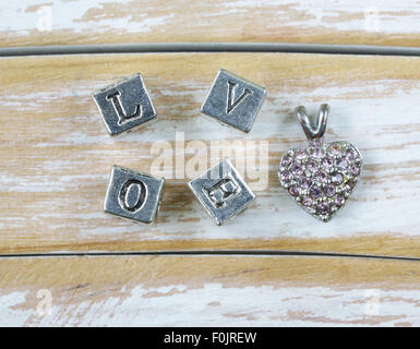 the word 'LOVE' written in metal letters Stock Photo