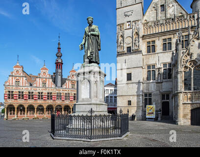 Statue of Dirk Martens, belfry, Aldermen's House and Borse of Amsterdam at the Grand Place in Aalst / Alost, Flanders, Belgium Stock Photo
